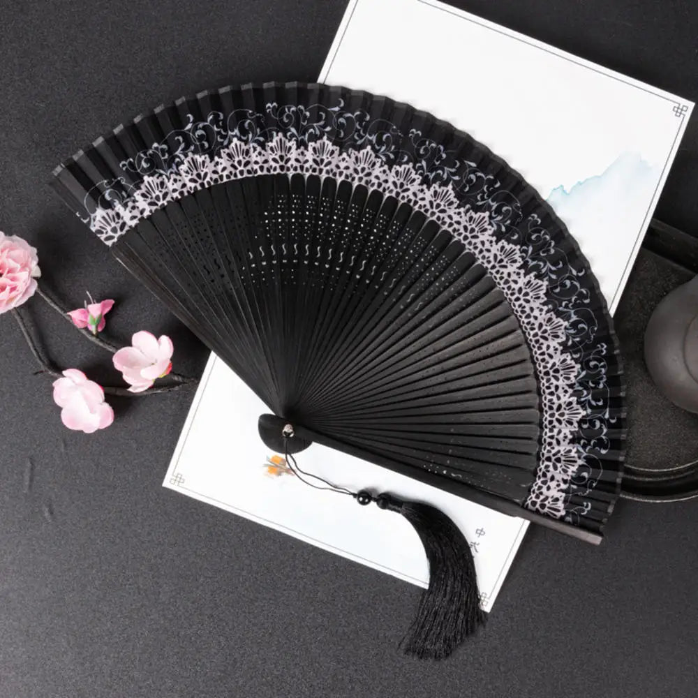 Traditional Bamboo Folding Fan with Solid Color Design