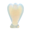 Hand-carved crystal figurine shaped like an angel with a pale blue translucent glow.