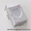 A clear plastic photo card album binder with a heart-shaped window and decorative text