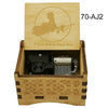 A wooden music box featuring a silhouette of a figure and waves, labeled 70-AJ2.