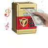 A hand is inserting a banknote into a gold and red ATM-style piggy bank with an electronic lock.