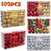 A collection of 102 Christmas ornaments in gold and red colors, including a star tree topper.