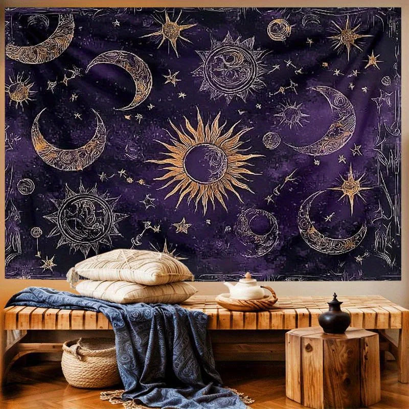 A dark purple tapestry featuring gold crescent moons, suns, and stars against a starry night sky.