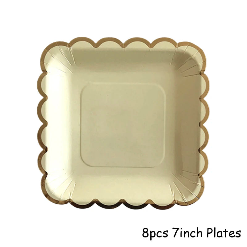 Eight 7-inch gold disposable party plates with scalloped edges