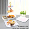 A set of three-tier and square white trays for serving food, including decorative golden stands.