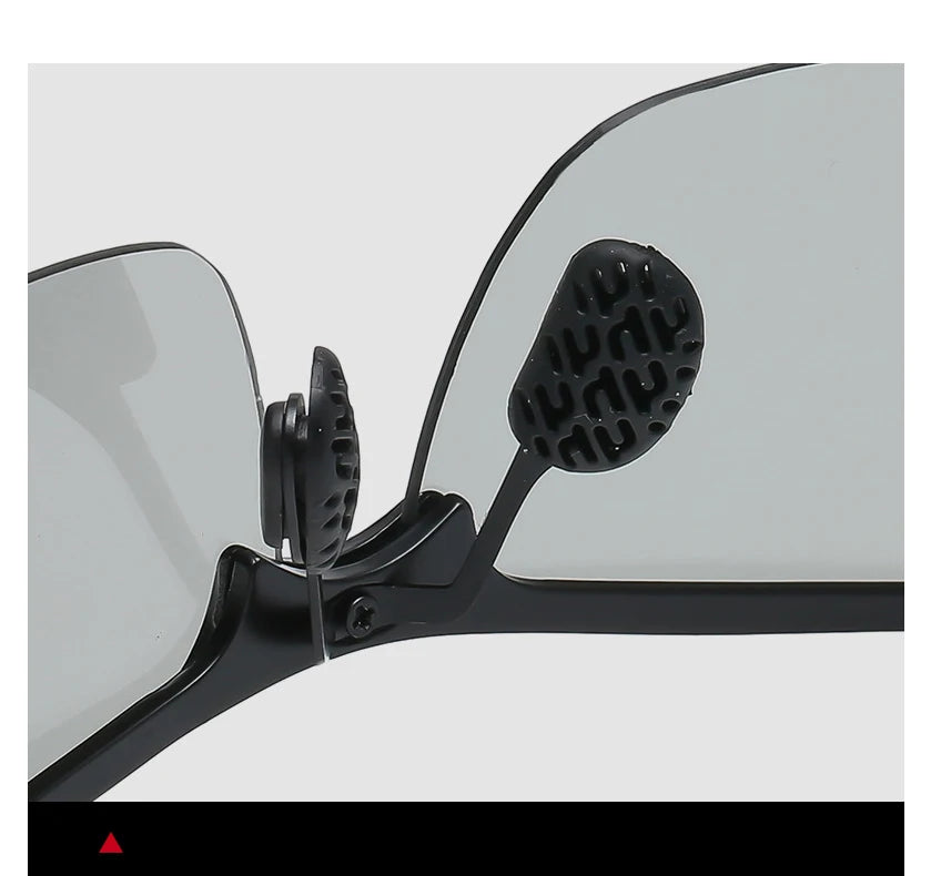 Close-up view of black photochromic polarized driving sunglasses with an alloy frame and textured lens