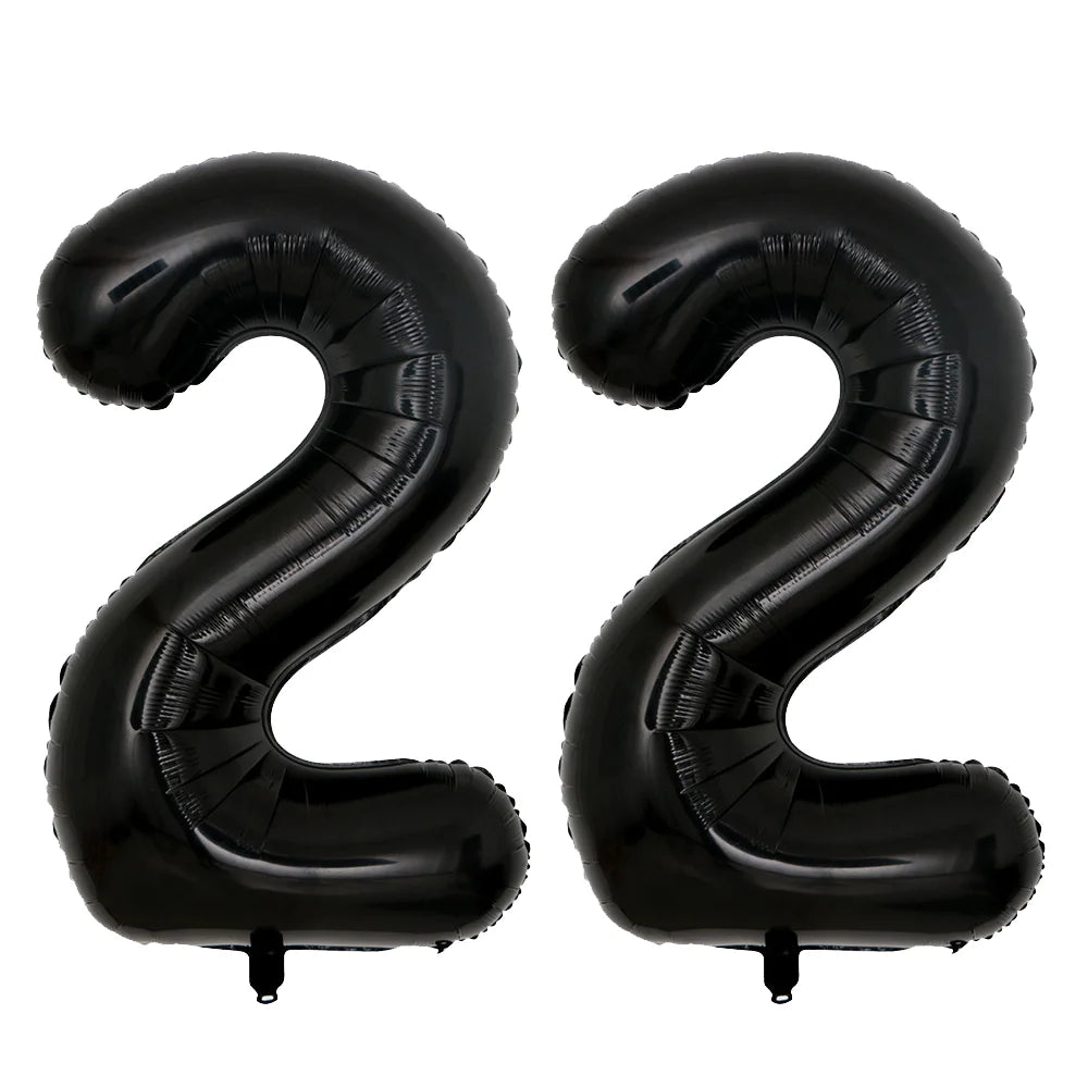 A set of two giant black foil balloons shaped like the number 22