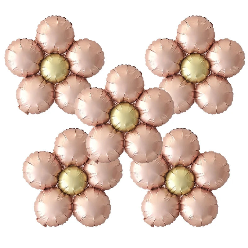 A set of five matte foil flower balloons in red and pink daisy designs.