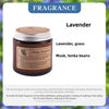 A jar of Lavender scented candle with a cork lid and a label detailing the fragrance notes.