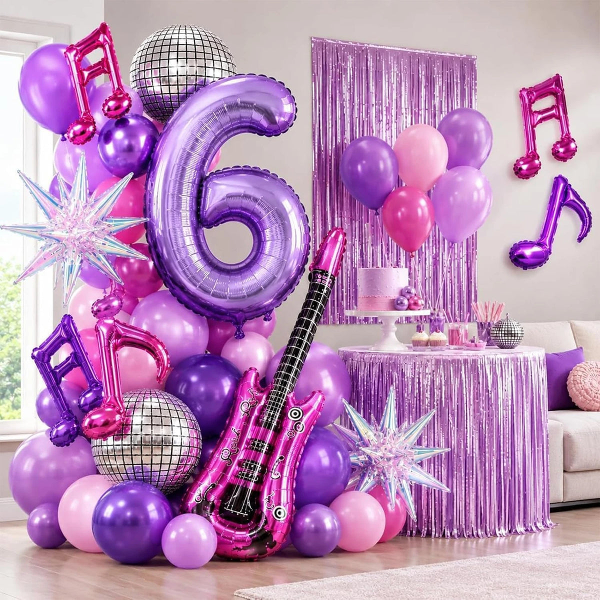 Purple music theme birthday party decorations featuring balloons and a guitar