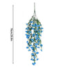 A long, cascading arrangement of blue silk morning glory vine flowers used for home decor.