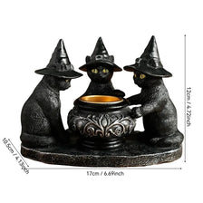 A black Halloween magic cat candle holder featuring three sculpted cats in a row.