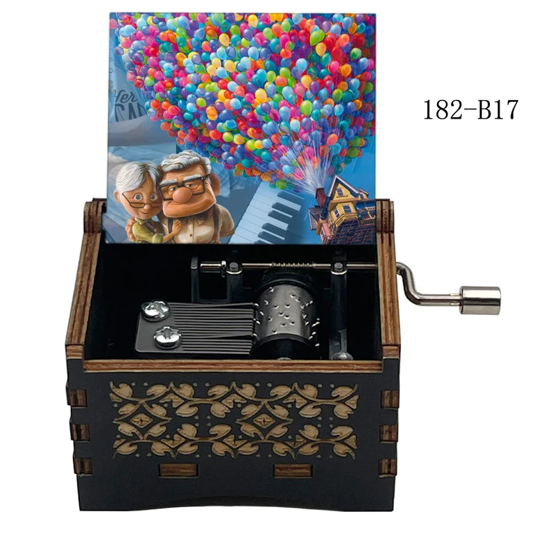 A wooden music box with a lid featuring a colorful fireworks display and a scene of a couple playing music.
