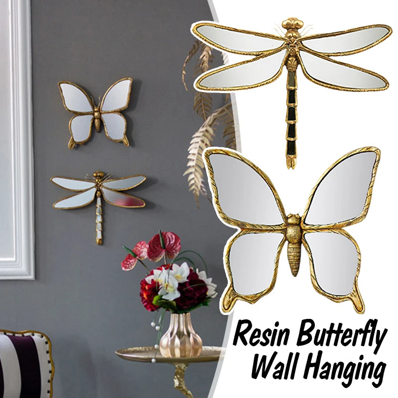 Resin butterfly wall hanging featuring a golden frame and mirror design.