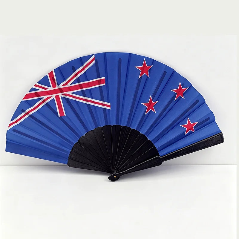 A blue folding hand fan decorated with the Union Jack flag and red stars.