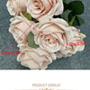A bouquet of silk roses in various shades of pink, peach, and white arranged for weddings and home decor.