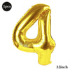 A shiny gold foil number balloon shaped like the number 4, measuring 32 inches.