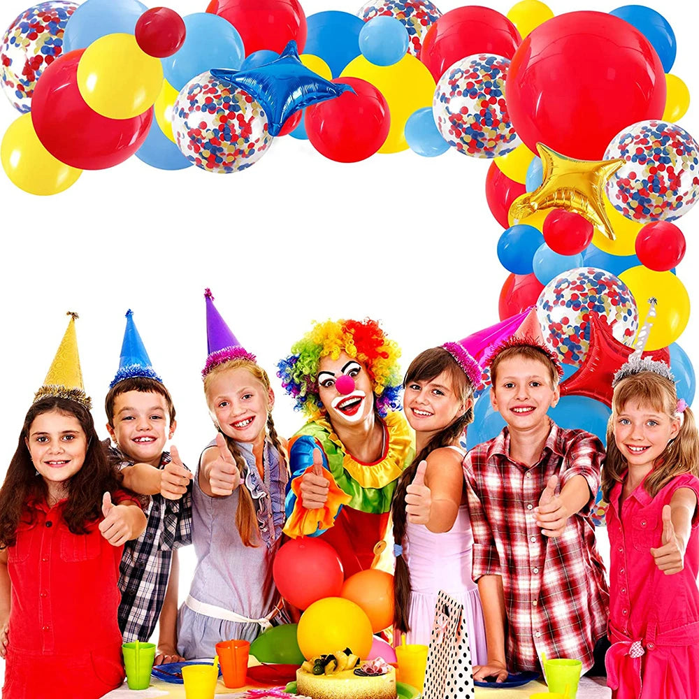 A colorful balloon garland arch kit featuring rainbow colors and star foil accents.