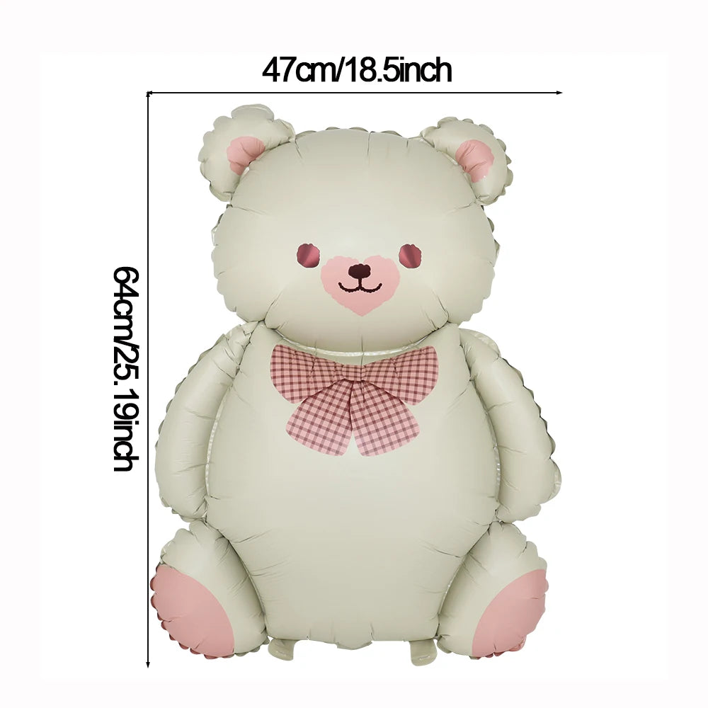 A light beige 3D foil balloon shaped like a cute bear with pink accents and a checkered bow.