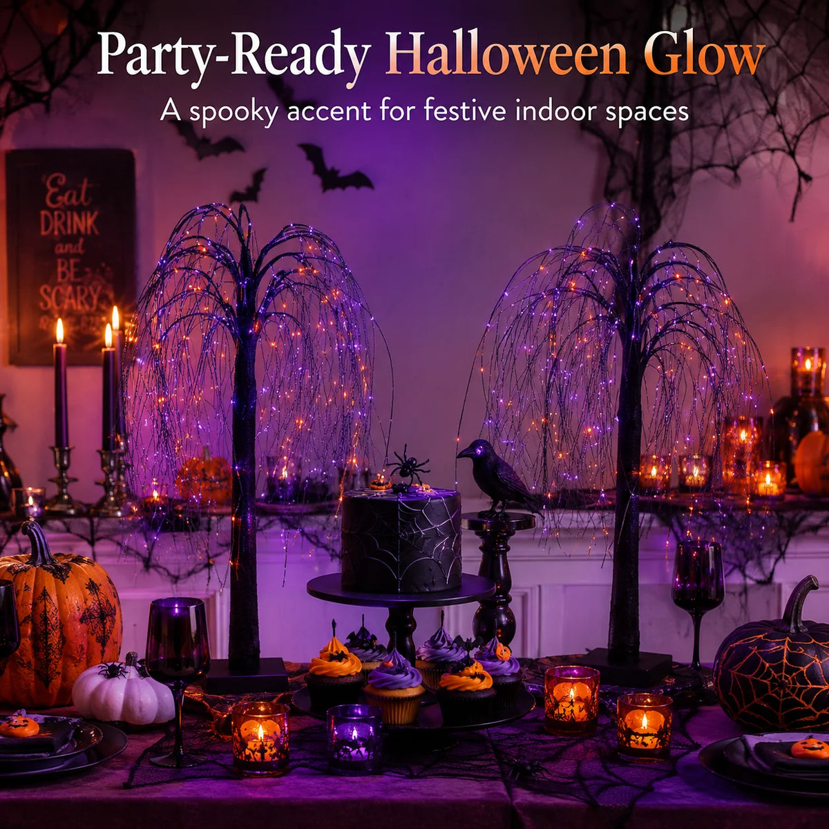 A spooky Halloween glow featuring lighted willow trees and pumpkins on a dark table.