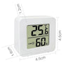 A white LED digital thermometer and hygrometer displaying 25.6 degrees Celsius and 60 percent humidity.