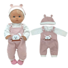 A pink doll outfit set including a hat and overalls for a baby doll.