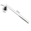 Stainless steel candle extinguisher tool with a bell-shaped head and long shaft.