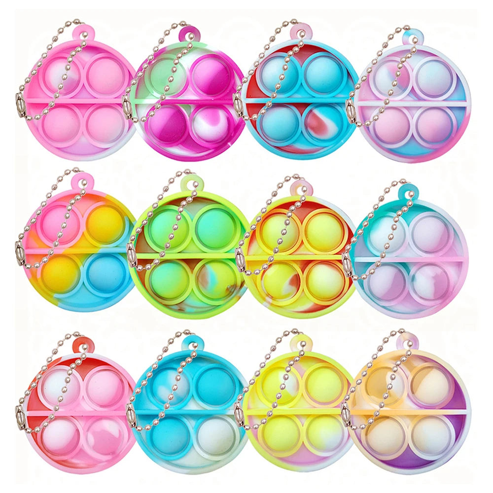 A set of colorful mini sensory fidget keychains featuring various pastel and bright colors.