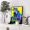 A poster featuring a neon cityscape and a character in a yellow and blue silhouette, displayed next to a potted plant.