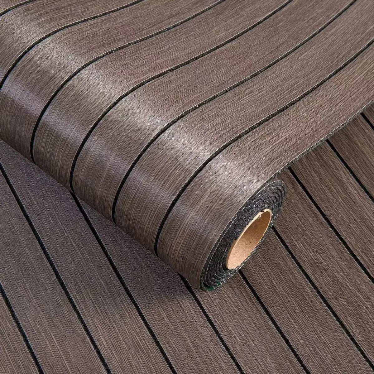 Roll of self-adhesive 3D wood grain wall panels showing a dark brown textured surface.