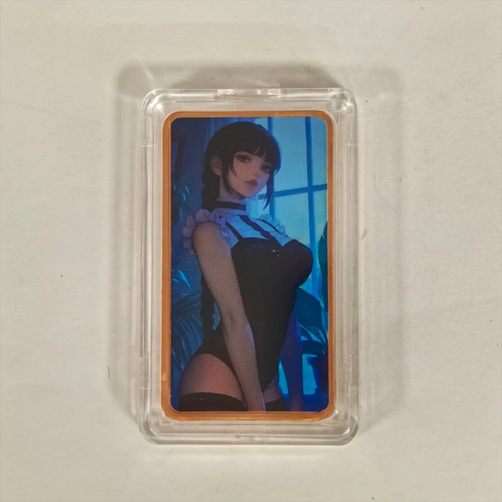 A fine copper fantasy art bar in a protective case with a dark-haired female figure.