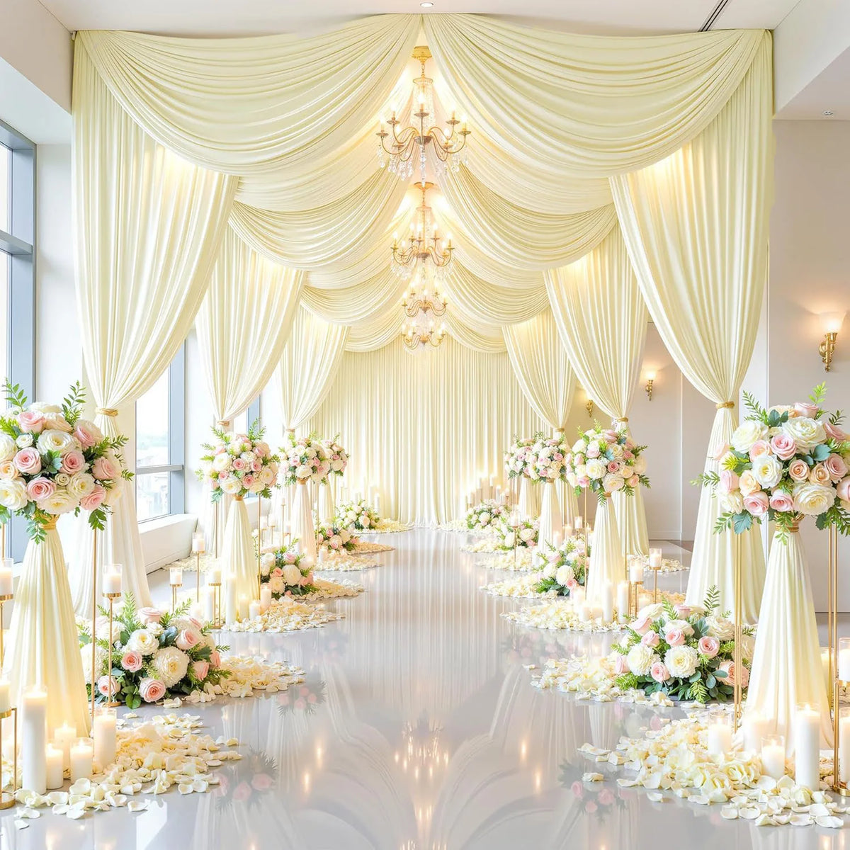 Elegant cream fabric backdrop curtains draped across a bright room for an event.