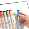 A hand holds a pack of whiteboard markers with fine tips in various colors, demonstrating strong magnetic adsorption.