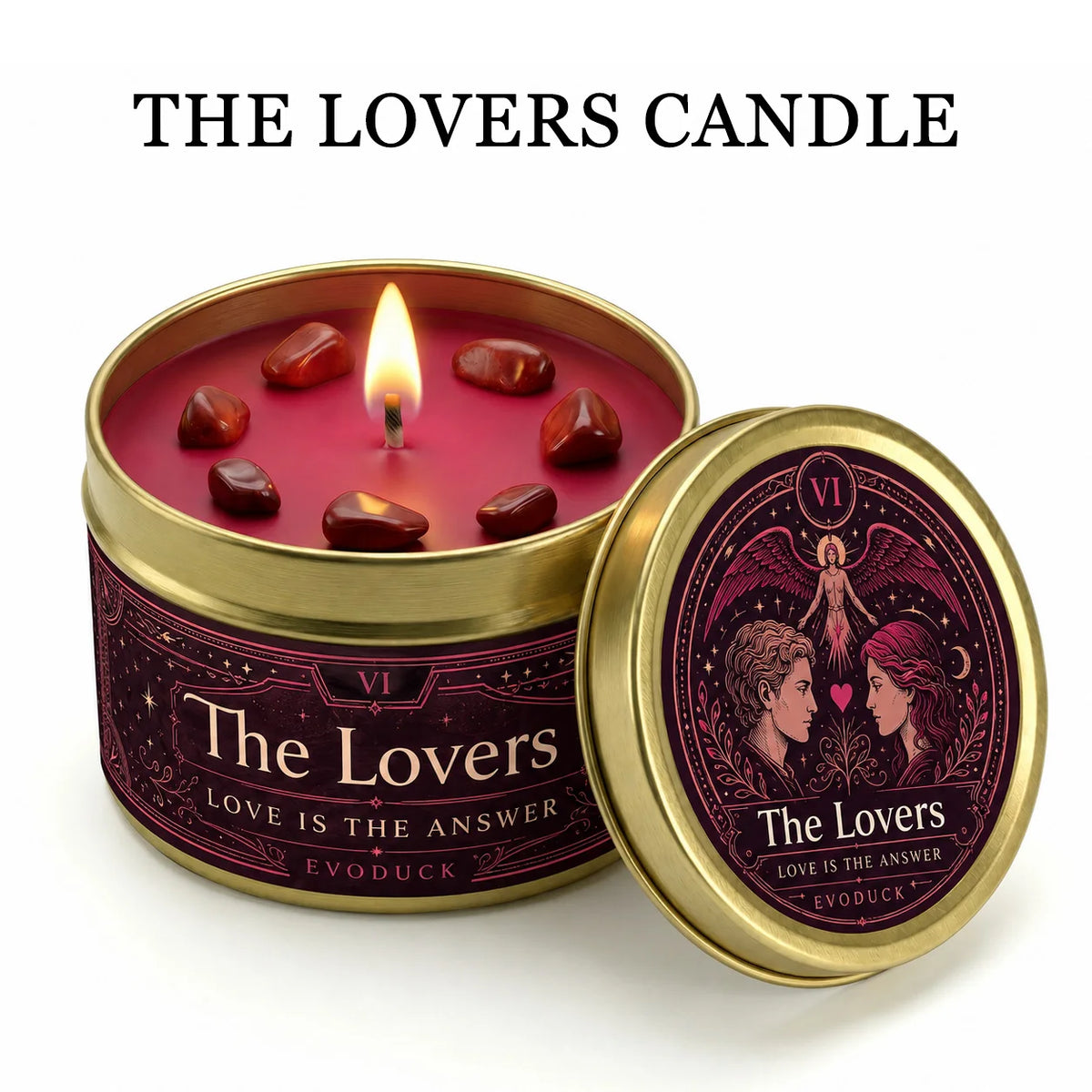 A jar of The Lovers candle with a lit wick and red wax, set against a dark pink background.