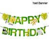 A set of green banner letters spelling HAPPY BIRTHDAY decorated with jungle animals like a lion, monkey, giraffe, and elephan