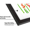 A black molding frame displays art horizontally and vertically, showing perfectly joined corners.