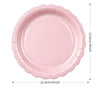 A pink scalloped paper plate with a diameter of 22.6cm and a depth of 9 inches.