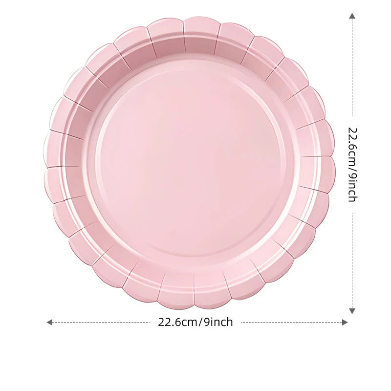 A pink scalloped paper plate with a diameter of 22.6cm and a depth of 9 inches.