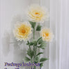 Artificial silk flower arrangement including three flower heads, stems, and a base.