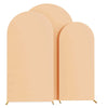 Three peach-colored arch stands or backdrops for wedding and event decor
