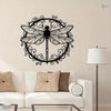 Elegant black dragonfly metal wall art featuring a detailed silhouette on a light-colored wall.