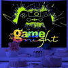 A dark background features a glowing yellow game controller graphic with bright green and purple splatter effects, set agains