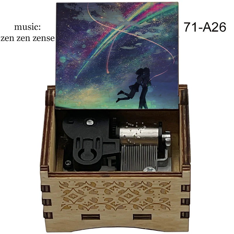 Adorno de caja de música de madera con una imagen colorida de una estrella fugaz y la silueta de dos figuras.