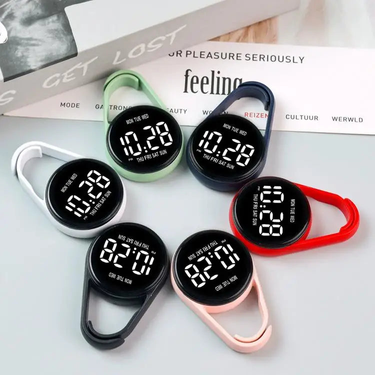A collection of black LED pocket watches with various colored bands and touch controls displayed on a white background.