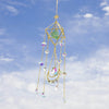A golden crystal sun catcher with a geometric design and hanging colorful glass beads.