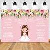 A pink and green floral backdrop for a First Communion celebration featuring a girl and decorative elements.