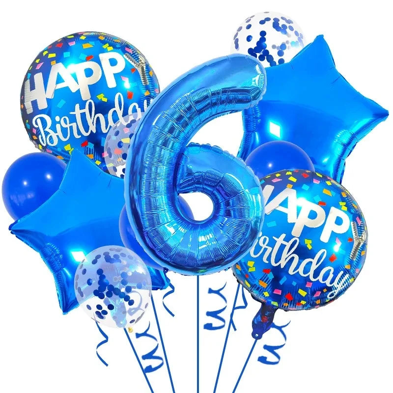 A set of navy and gold foil balloons shaped like the number six and a star for a birthday celebration