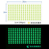 A grid of 144 glow-in-the-dark stars on a light green background, showing both day and night illumination.
