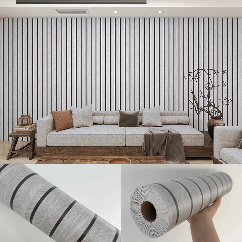 Roll of faux wood grain self-adhesive wallpaper showing a textured gray pattern.