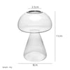 A clear, mushroom-shaped glass vase with a wide opening and a tapered base.